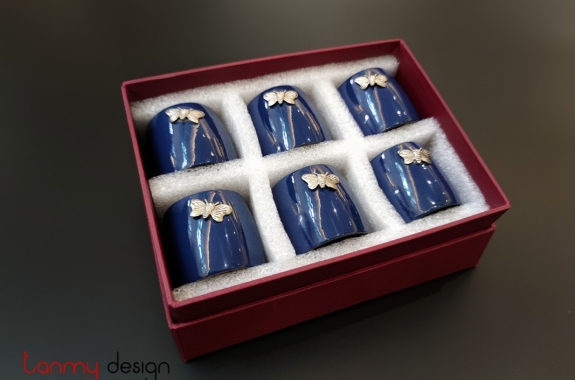 Set of 6 dark blue napkin rings attached with butterfly